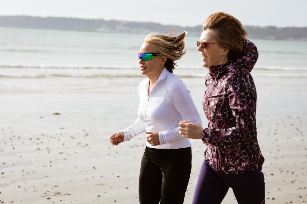Image of 2 people running